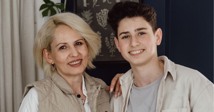 mother and son smiling