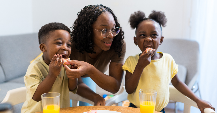 Mother feeding children